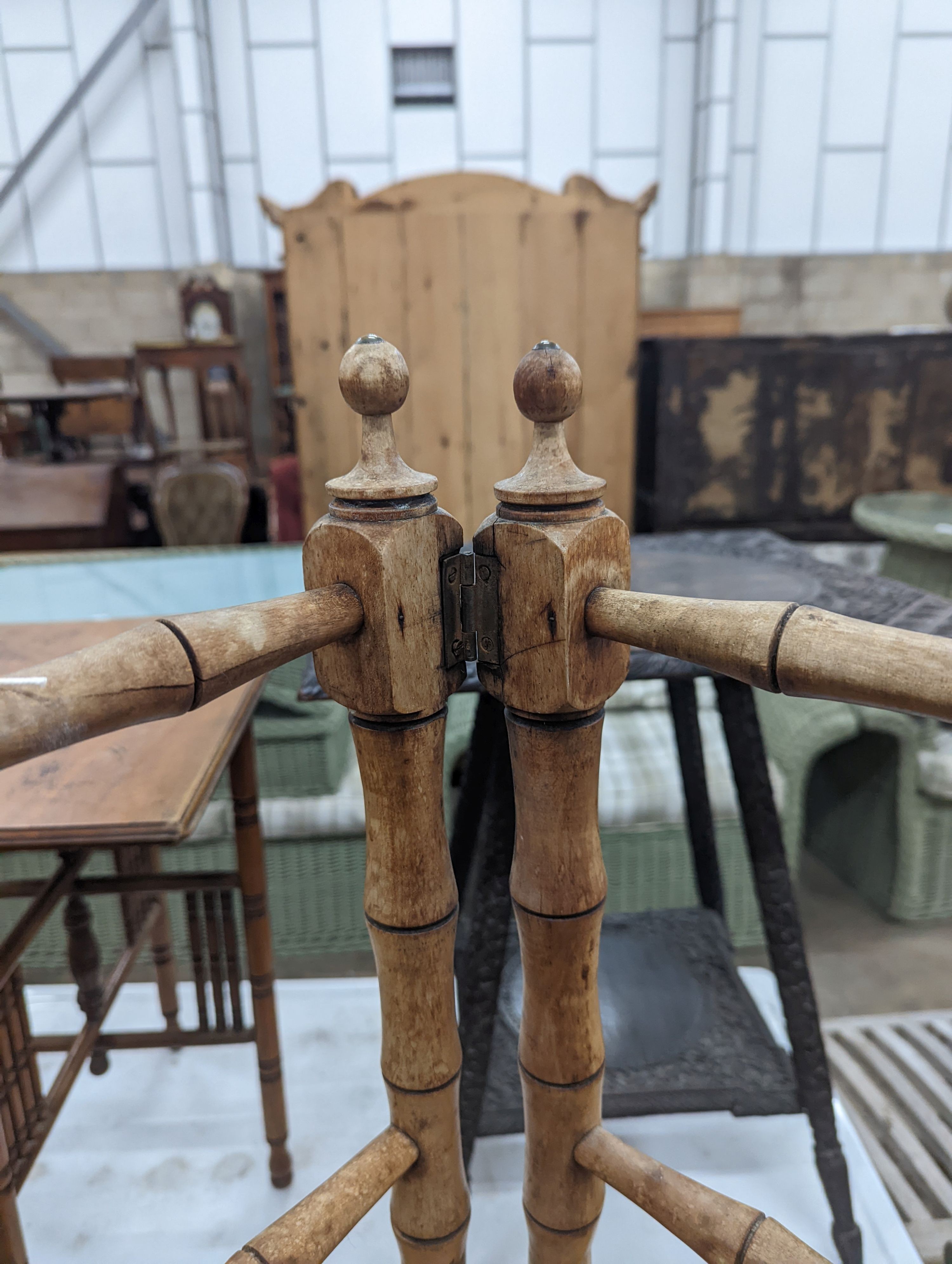 A Victorian simulated bamboo rectangular painted occasional table, width 71cm, depth 46cm, height 70cm together with a folding towel rail